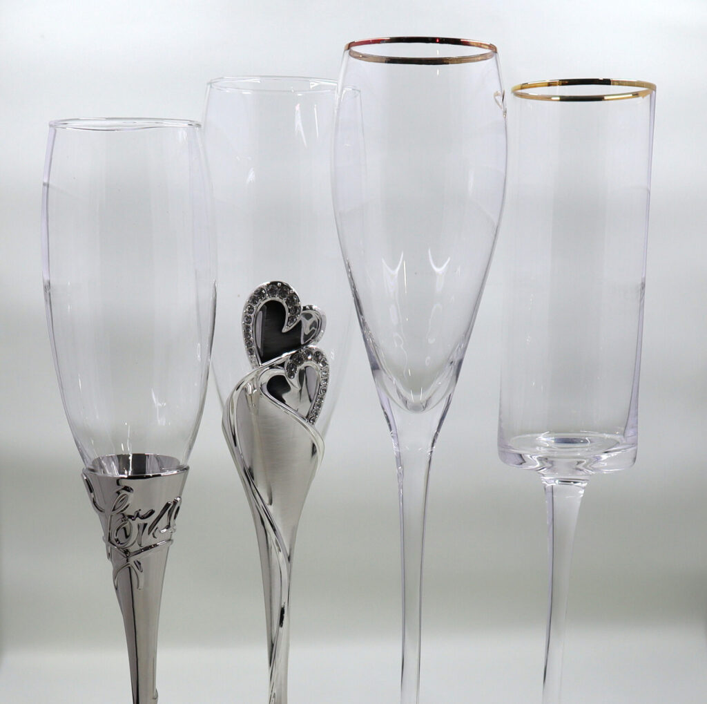 wedding stemware in a variety of shapes and designs that can be engraved with wedding details 
