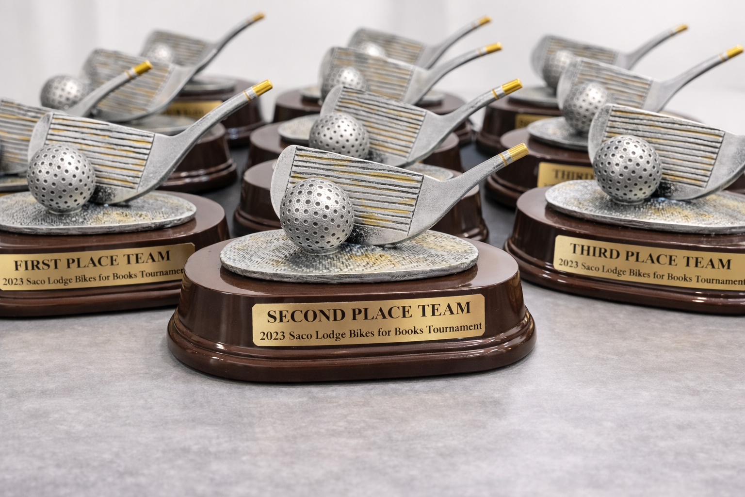 Golf Trophies with custom engraved metal plates 